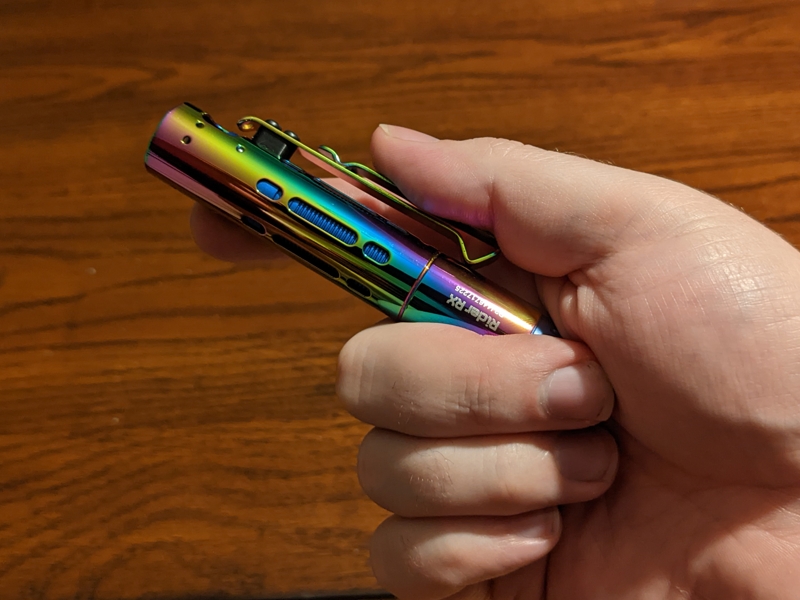 Acebeam Rider RX Rainbow PVD in hand